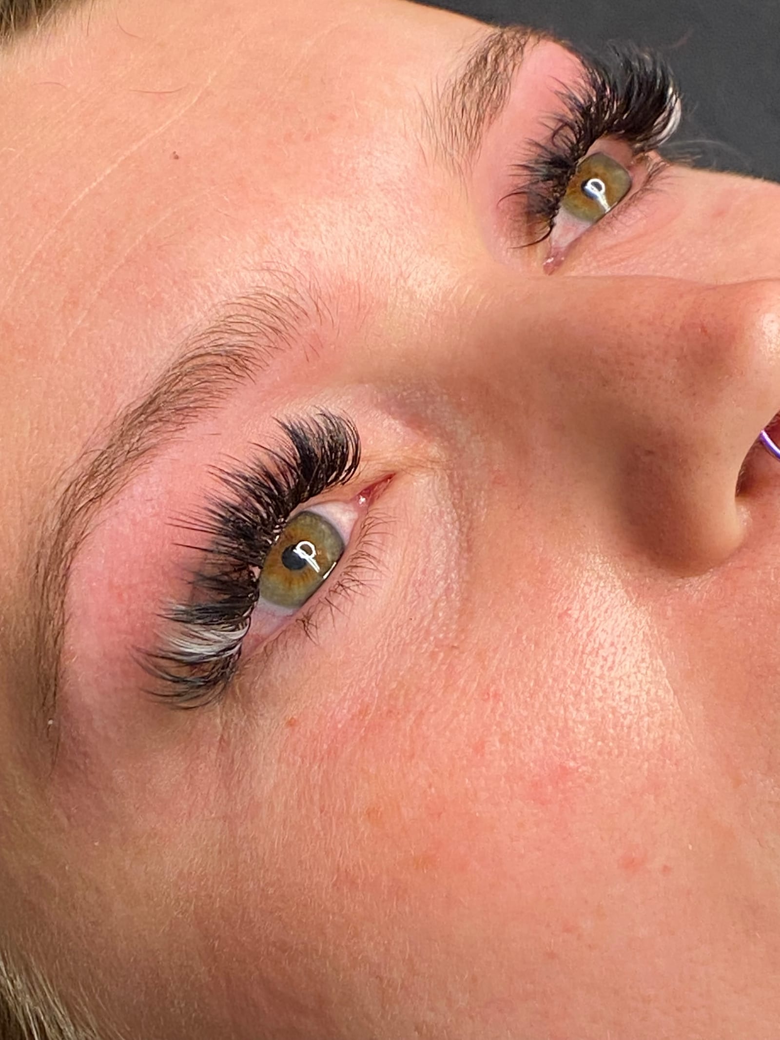 Upper lashline enhancement, with pigment set between the lashes