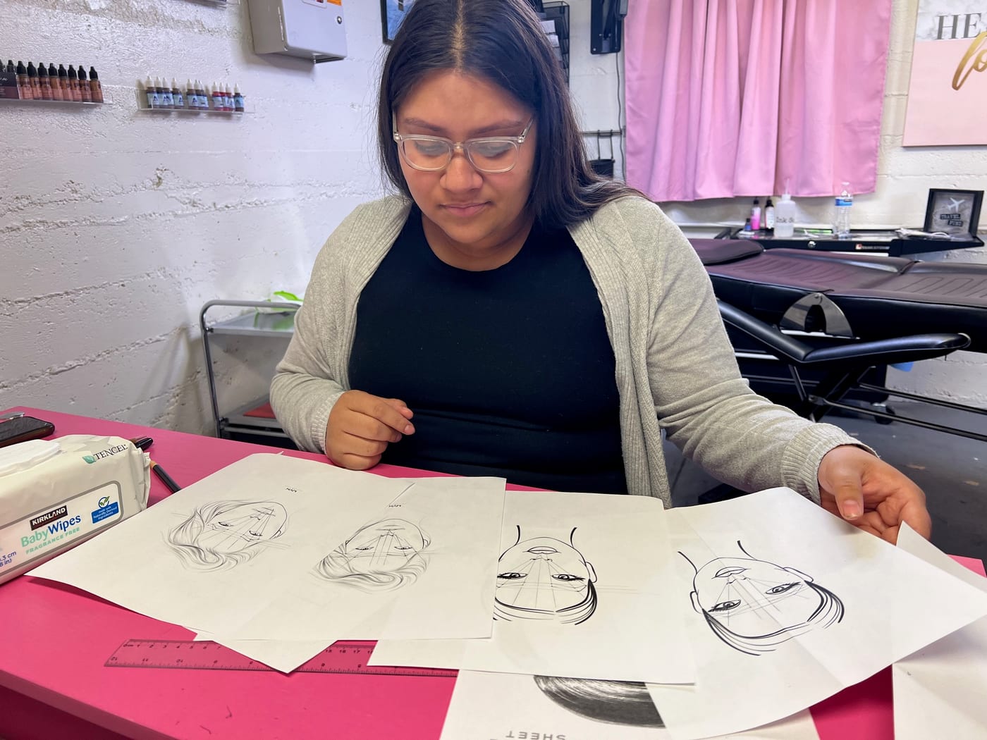 Face charts and brow mapping practice sheets at the academy
